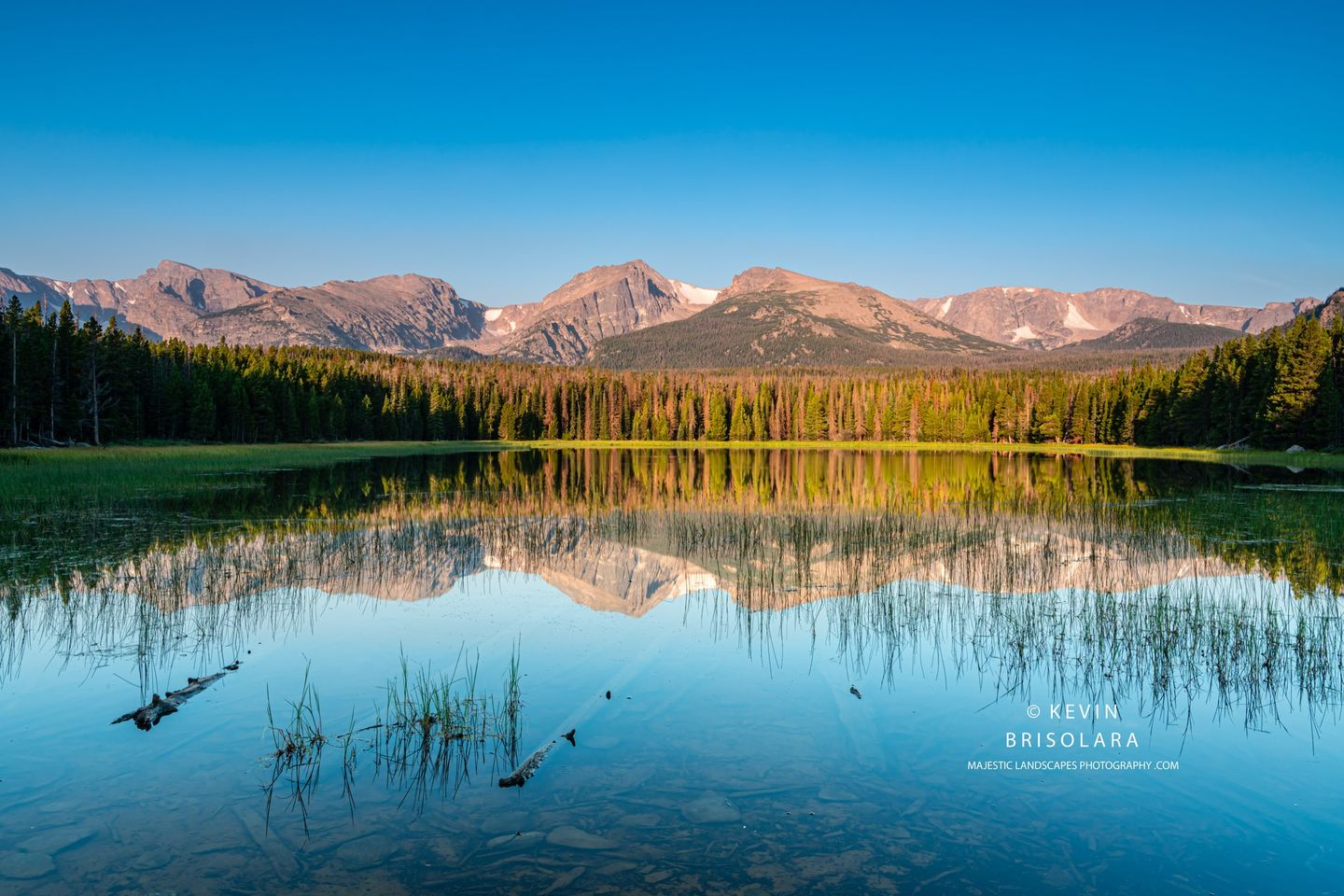 REFLECTIONS OF THE MOUNTAINS