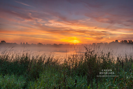 A SPECTACULAR SUNRISE WITH A MISTY LAKE