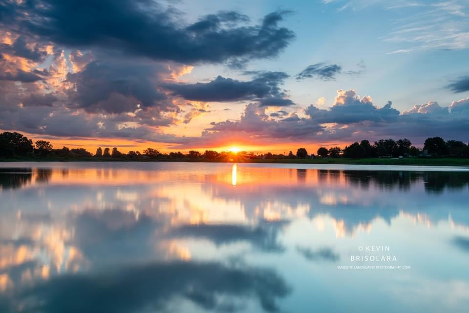 REFLECTIONS OF A SUMMER SUNRISE