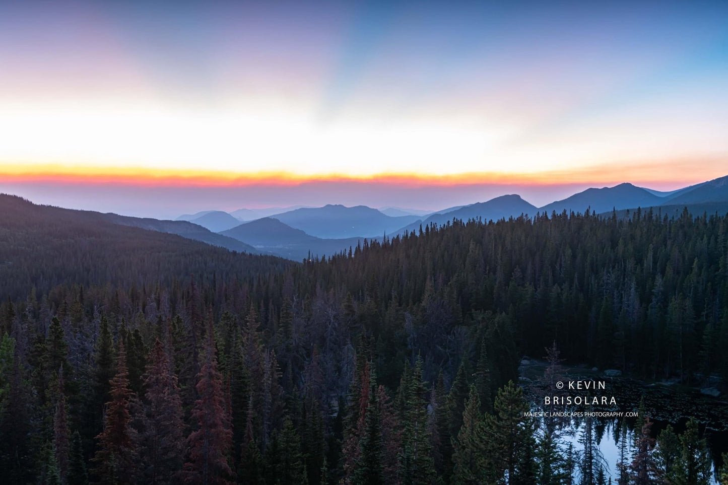 A COLORFUL SUNRISE ABOVE THE LAKE